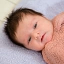 A photograph of a baby.