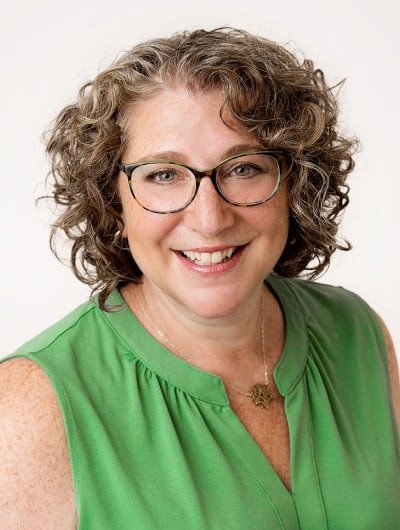 A photograph of Dara Roth Edney.