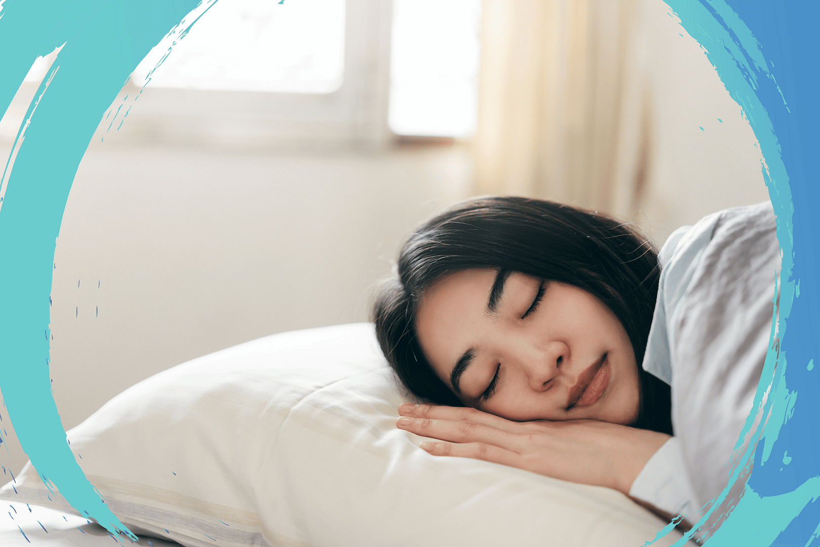 Asian woman sleeping with hand on pillow