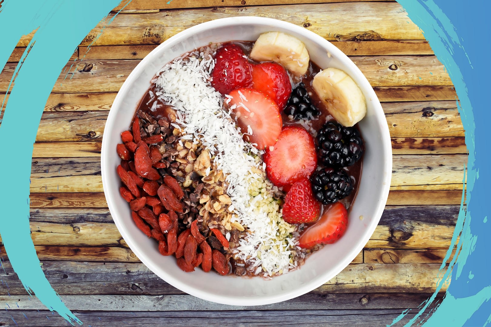 Acai Bowl with fruit, nuts, and seeds.