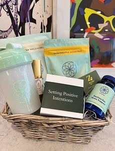 Photo of contents of EVOLVE spring giveaway basket self care kit