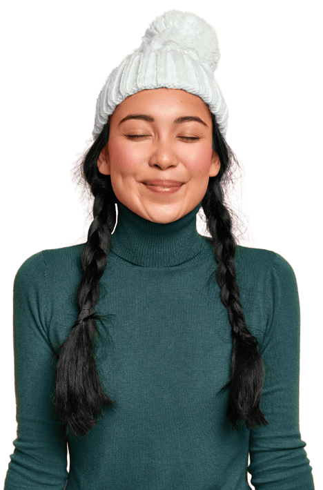 A smiling person with closed eyes.