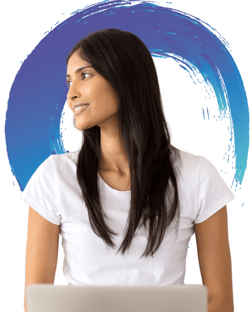 A smiling person sitting in front of a laptop with the Evolve logo in the background.