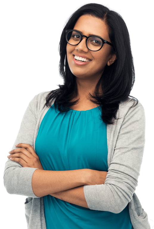 A smiling person standing with crossed arms.